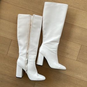 White knee high boots